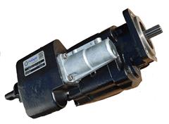 Black industrial electric motor with cylindrical metal body and shaft